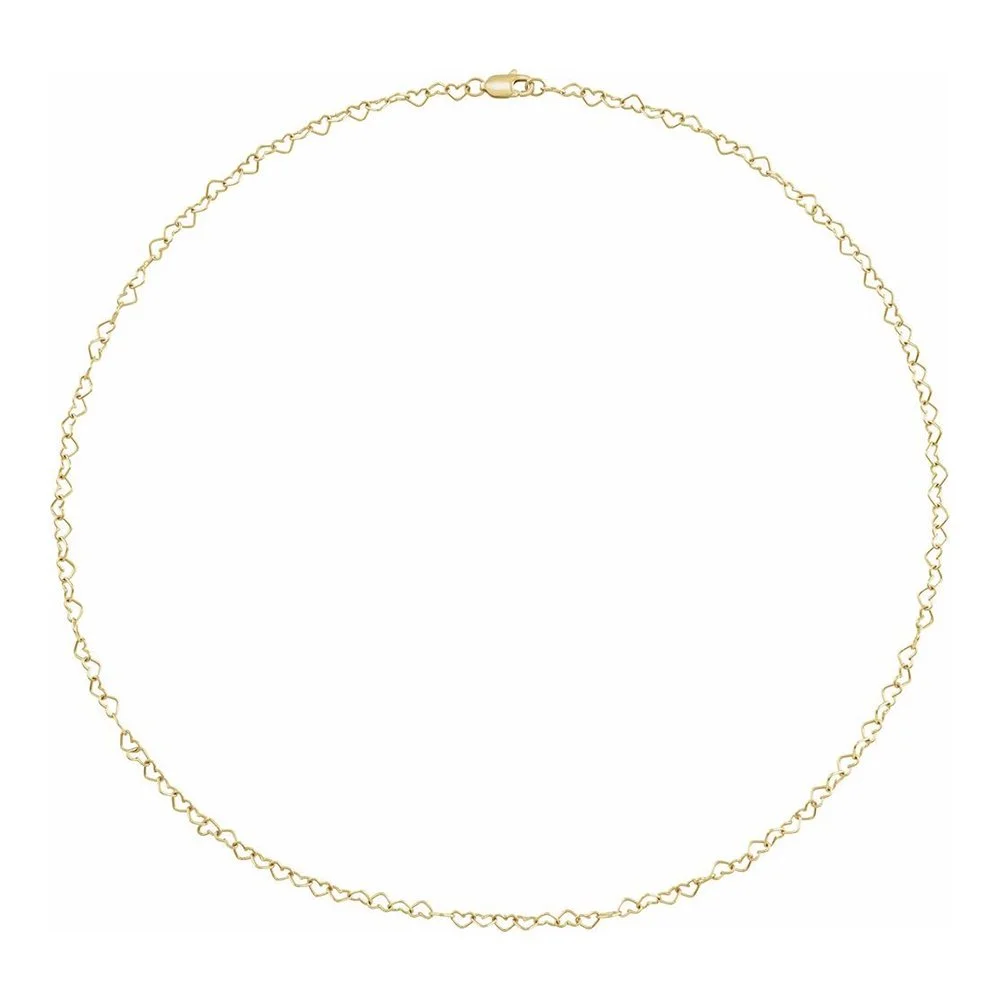 A gold necklace with small heart-shaped links