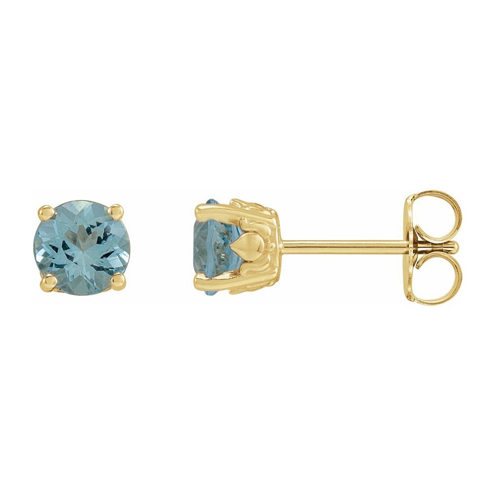 Gold stud earrings with round blue gemstones.