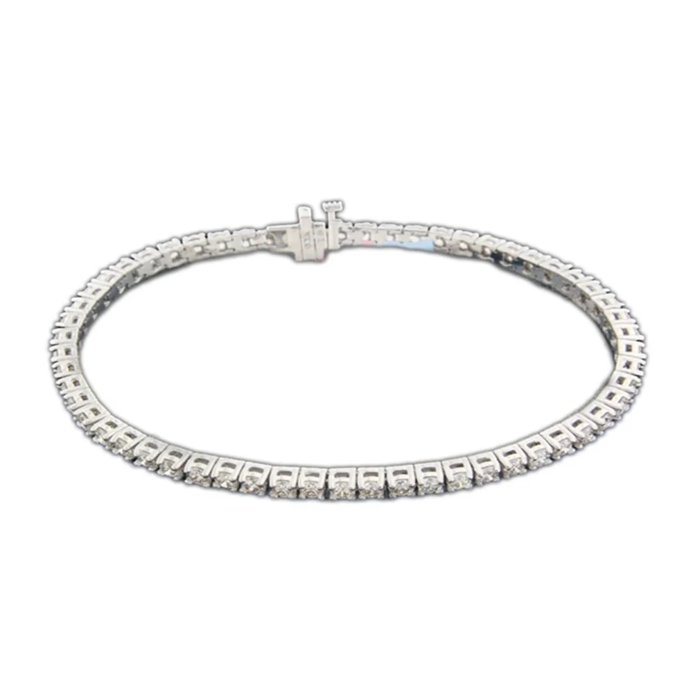 Silver necklace with evenly spaced square links and small stones.