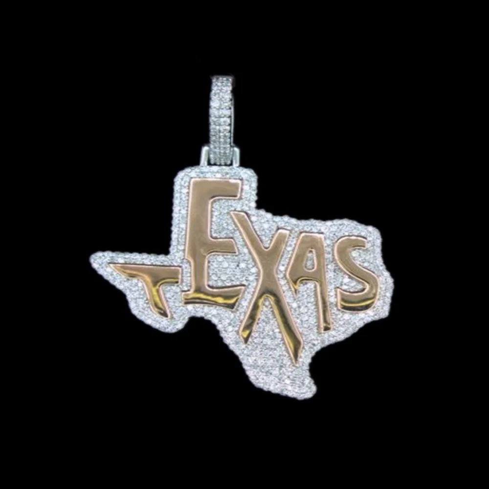 Pendant shaped like the state of Texas with the word 'TEXAS' in gold letters, encrusted with diamonds.