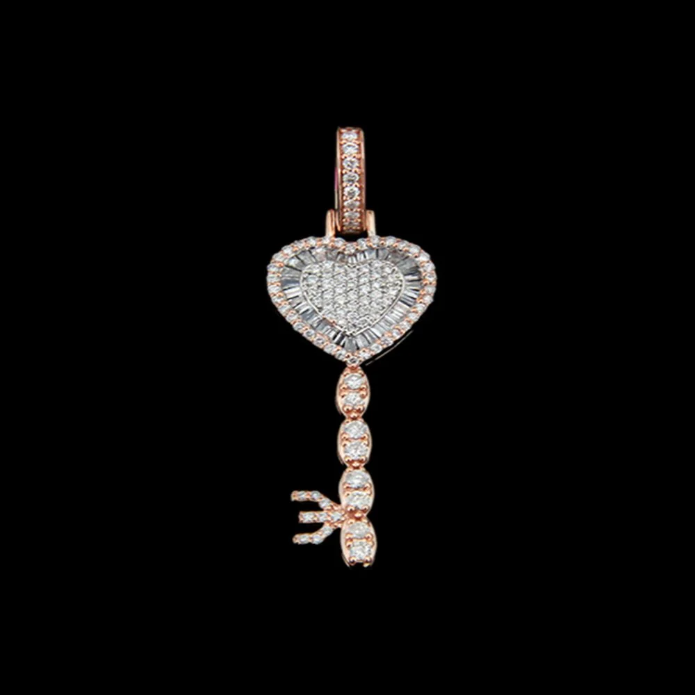 Pendant featuring a heart-shaped design with embedded diamonds, a dangling chain of diamonds, and a bow-shaped charm at the end, set against a black background.