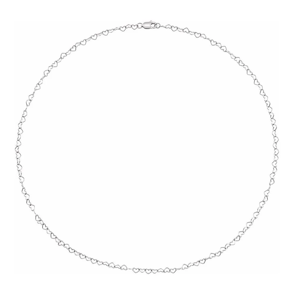Silver chain necklace with heart-shaped links on a white background.