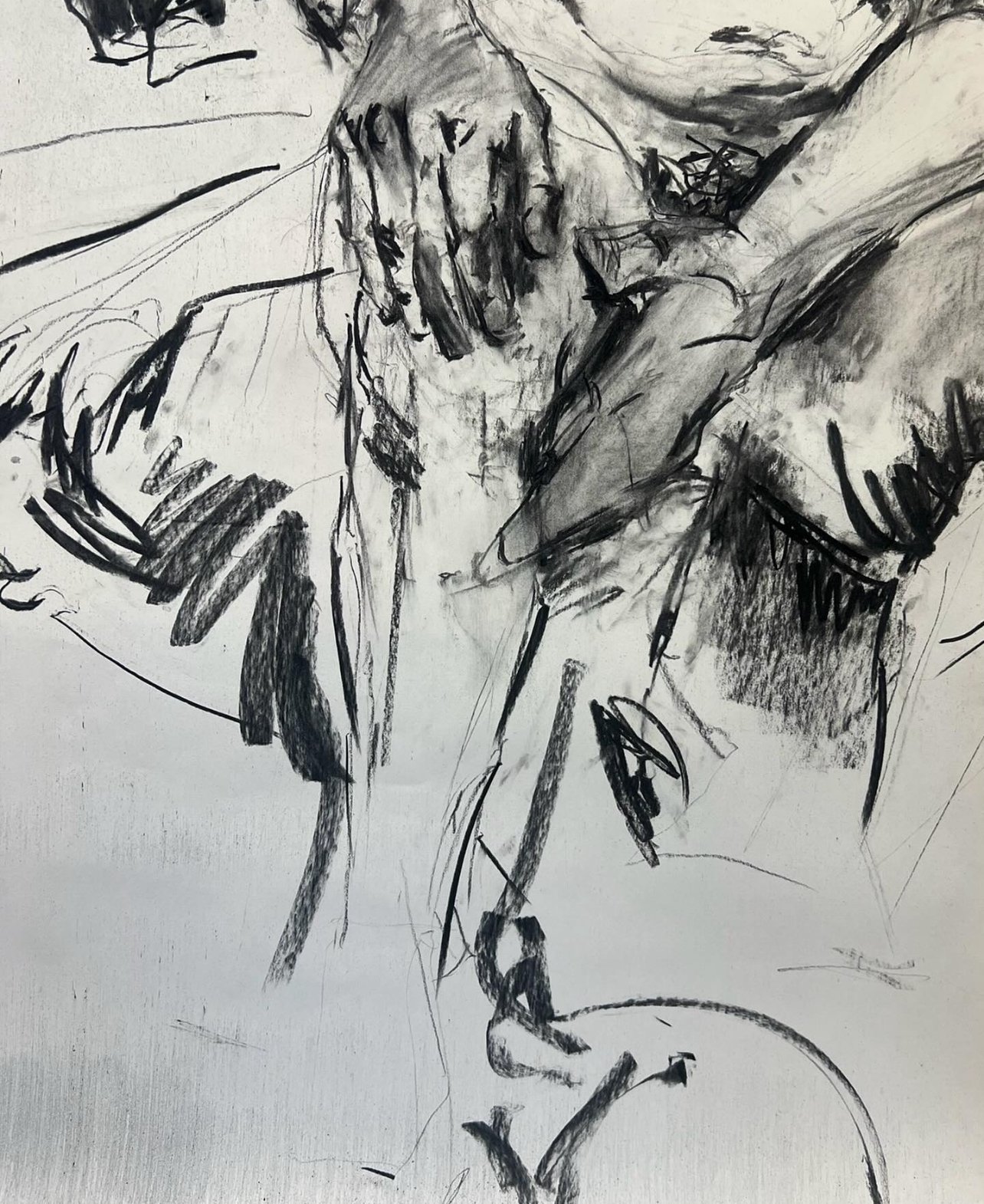 A black and white sketch of a person sitting at a piano, with their left hand on the keys and their head resting on their right hand.