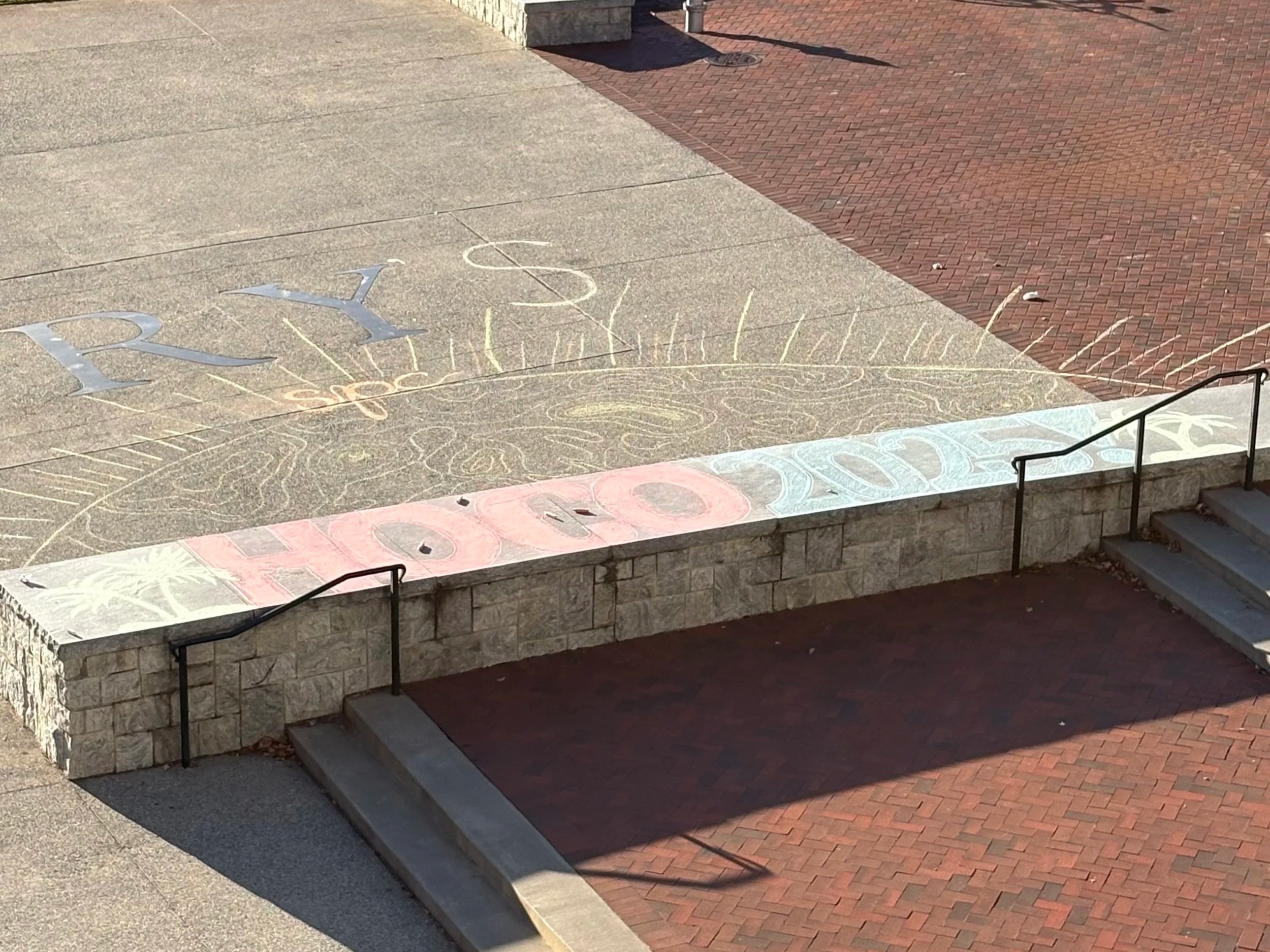 Chalk installations used as high-visibility, site-specific campus outreach.
