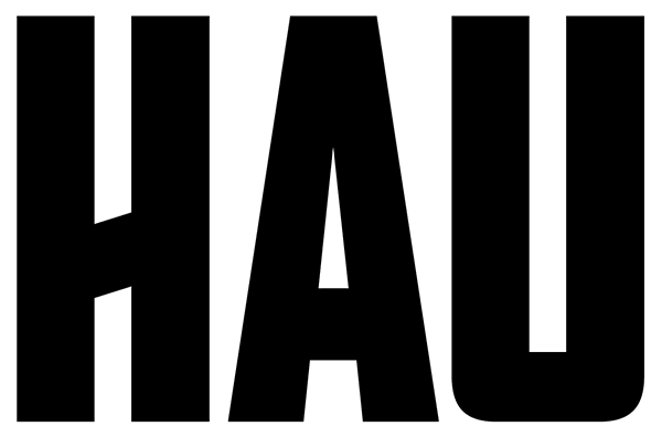 Close-up of large, black, bold text spelling 'HAU' on a white background.