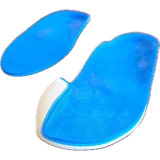 A woman with short blonde hair sitting on a beige bench, writing in a notebook, with sunlight creating shadows on the wall behind her and an abstract artwork nearby.