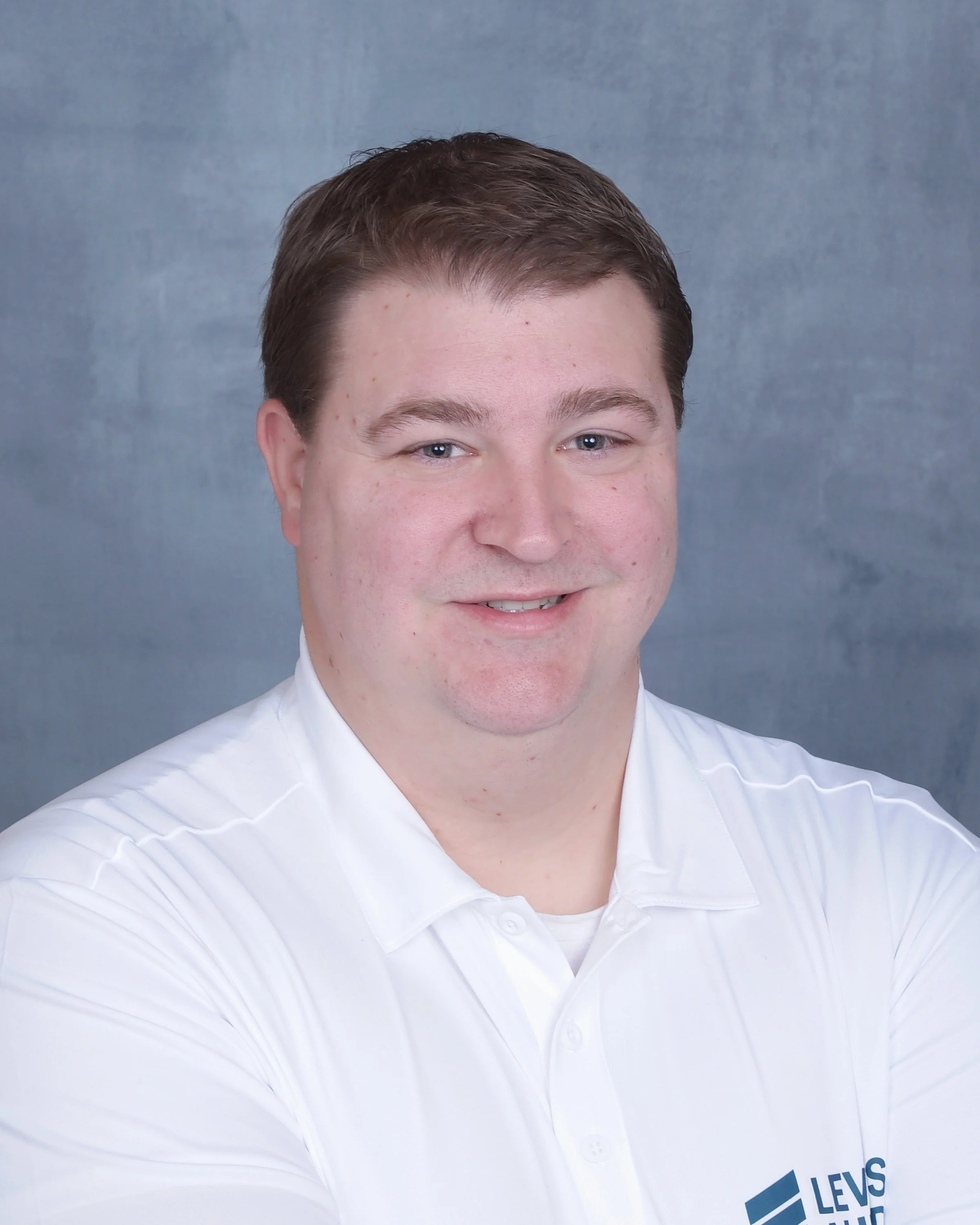 Brandon Nault owner of Levels Ahead Painting in Macomb County