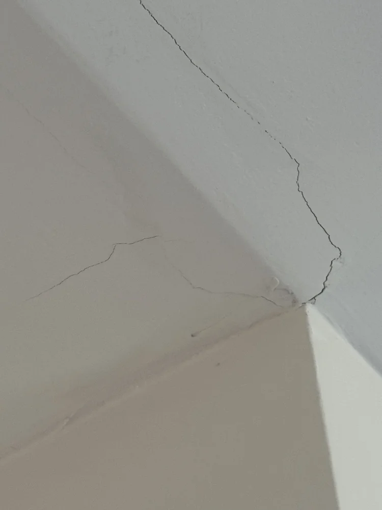 Ceiling drywall crack before repair