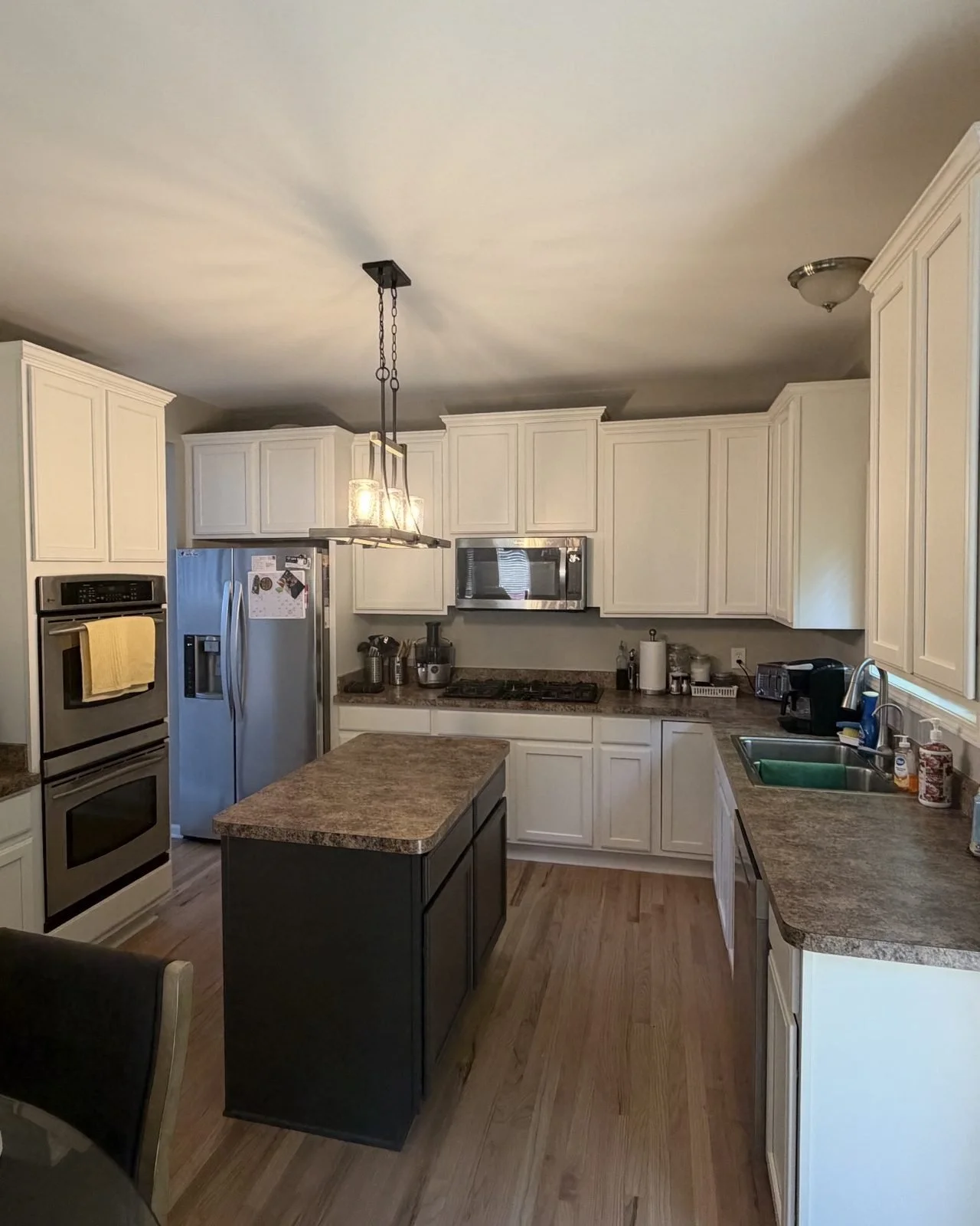 Kitchen cabinets after painting, white painted cabinets with dark painted island, White Lake MI