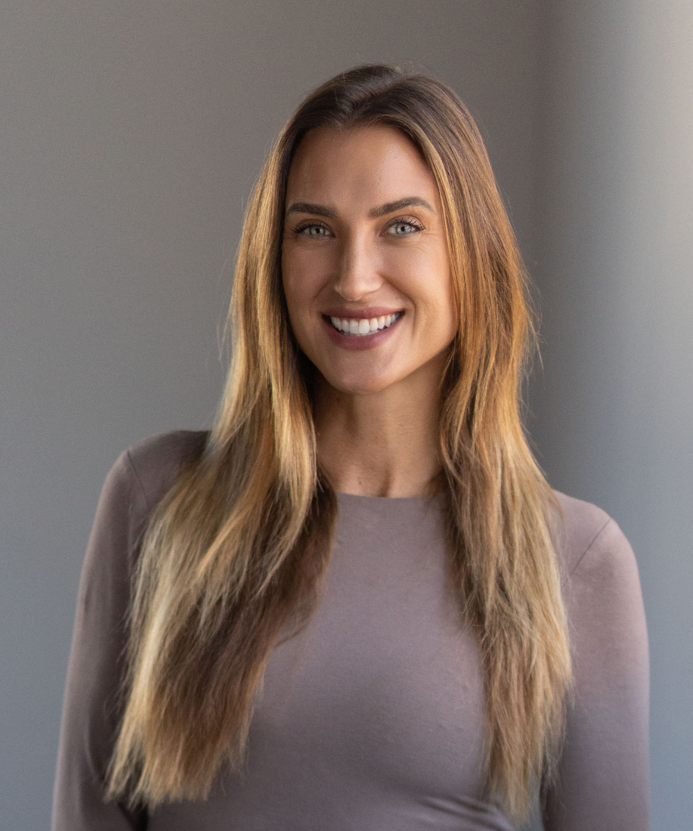 A headshot of Brenna Akkerman, Director of Marketing for U.S. WDS