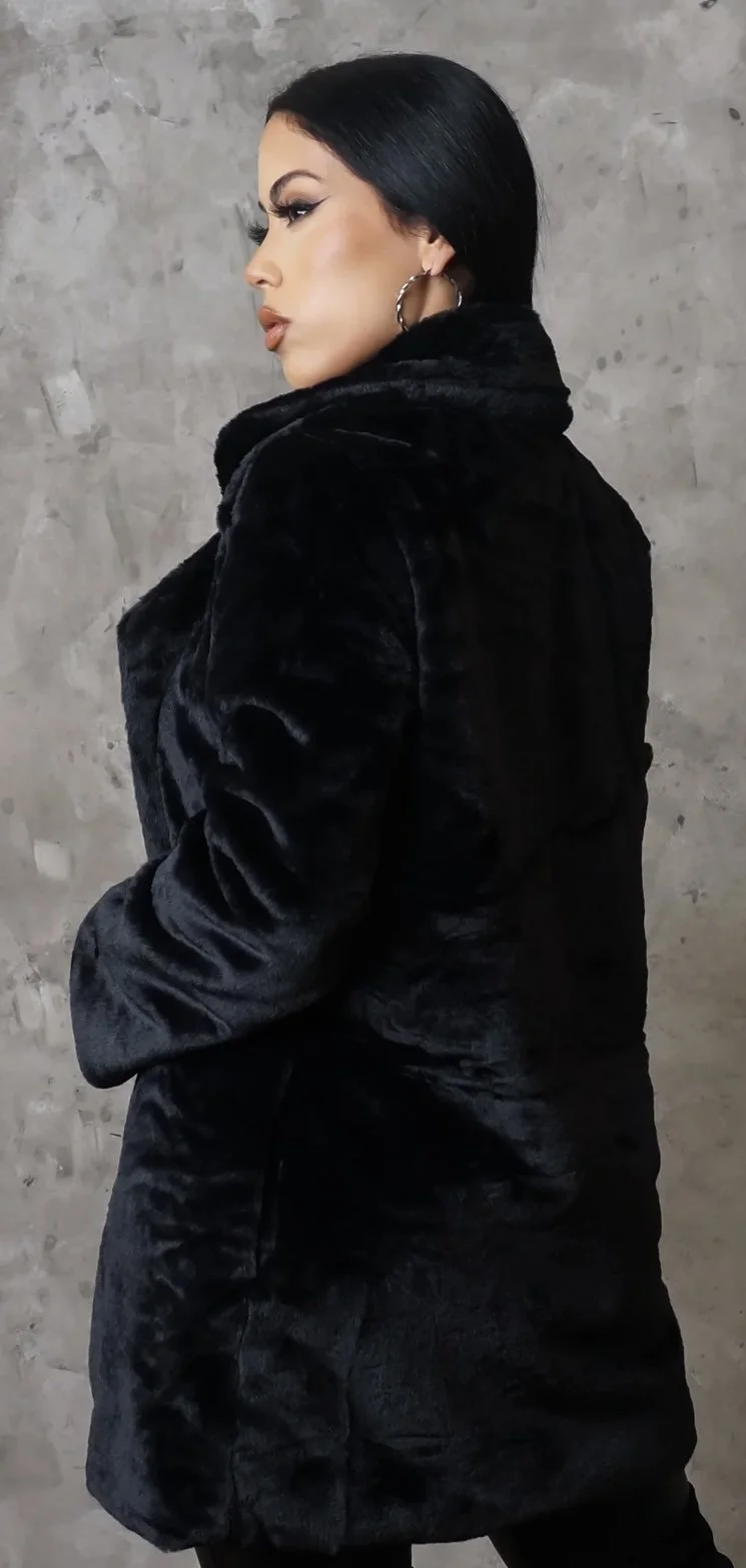 woman's faux fur coat