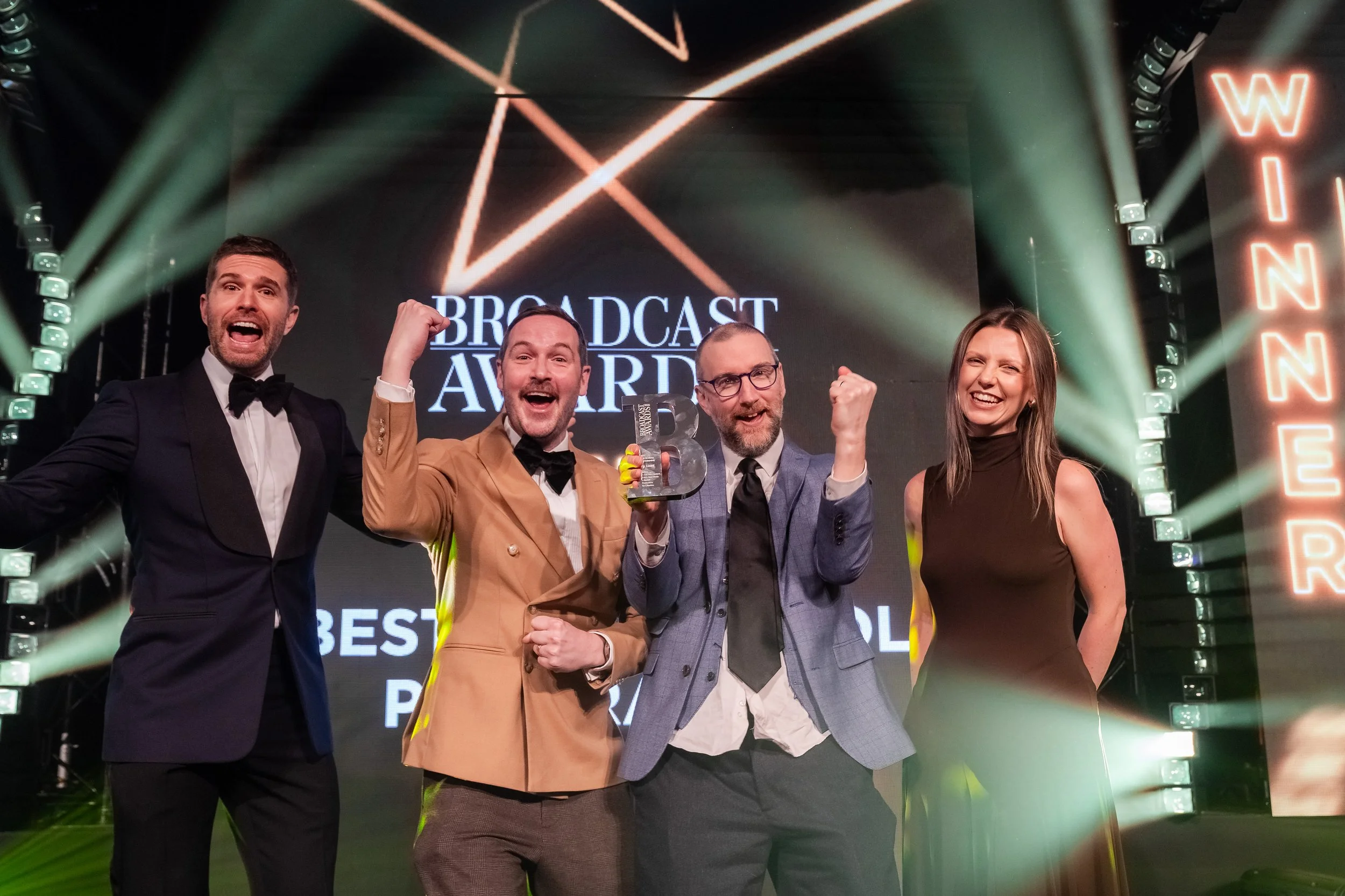 Steve Smith and BBC exec Nick Hall collecting an award for Big Lizard at the Broadcast Awards 2026.