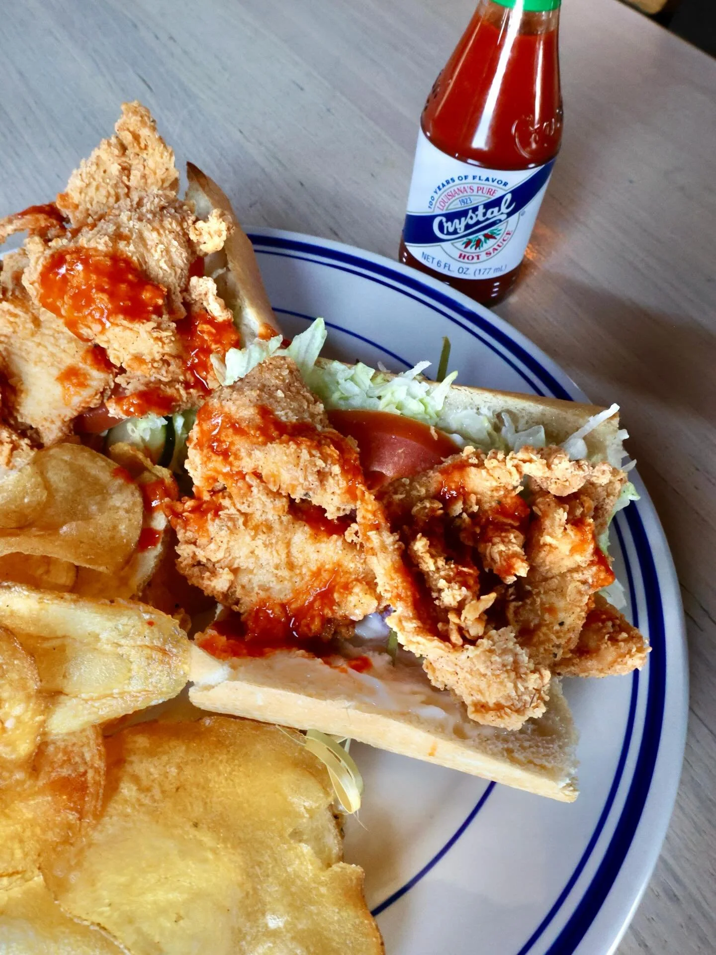 Bringing a little bit of NOLA to LOSO. 🥖

Sink your teeth into a New Orleans-style baguette filled with crispy golden chicken and all the po&rsquo; boy fixings. We want all the crispy chicken and a heavy pour of Crystal Hot Sauce.

How much heat can