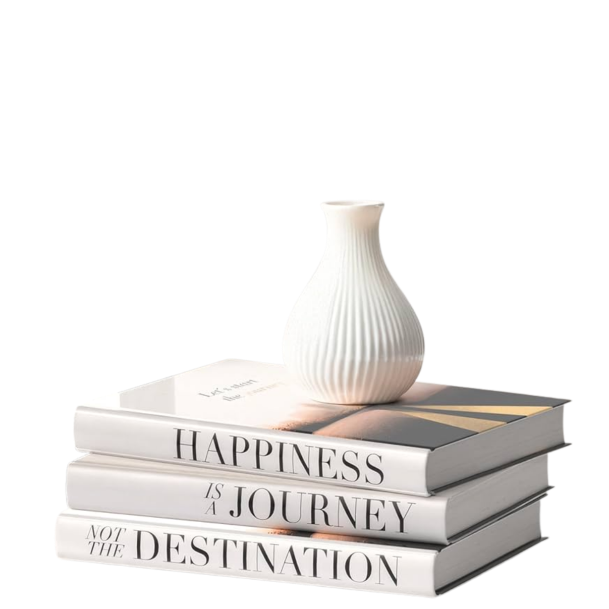 Cuatro libros apilados con una pequeña vasija blanca sobre ellos, en colores neutros y texto en inglés en los lomos de los libros que dice 'Happiness is a journey not the destination'.