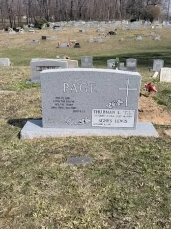 Grayscale headstone in a cemetery, engraved with the name Page, and a cross symbol, dedicated to Thurman L. T., and Agnes Lewis.