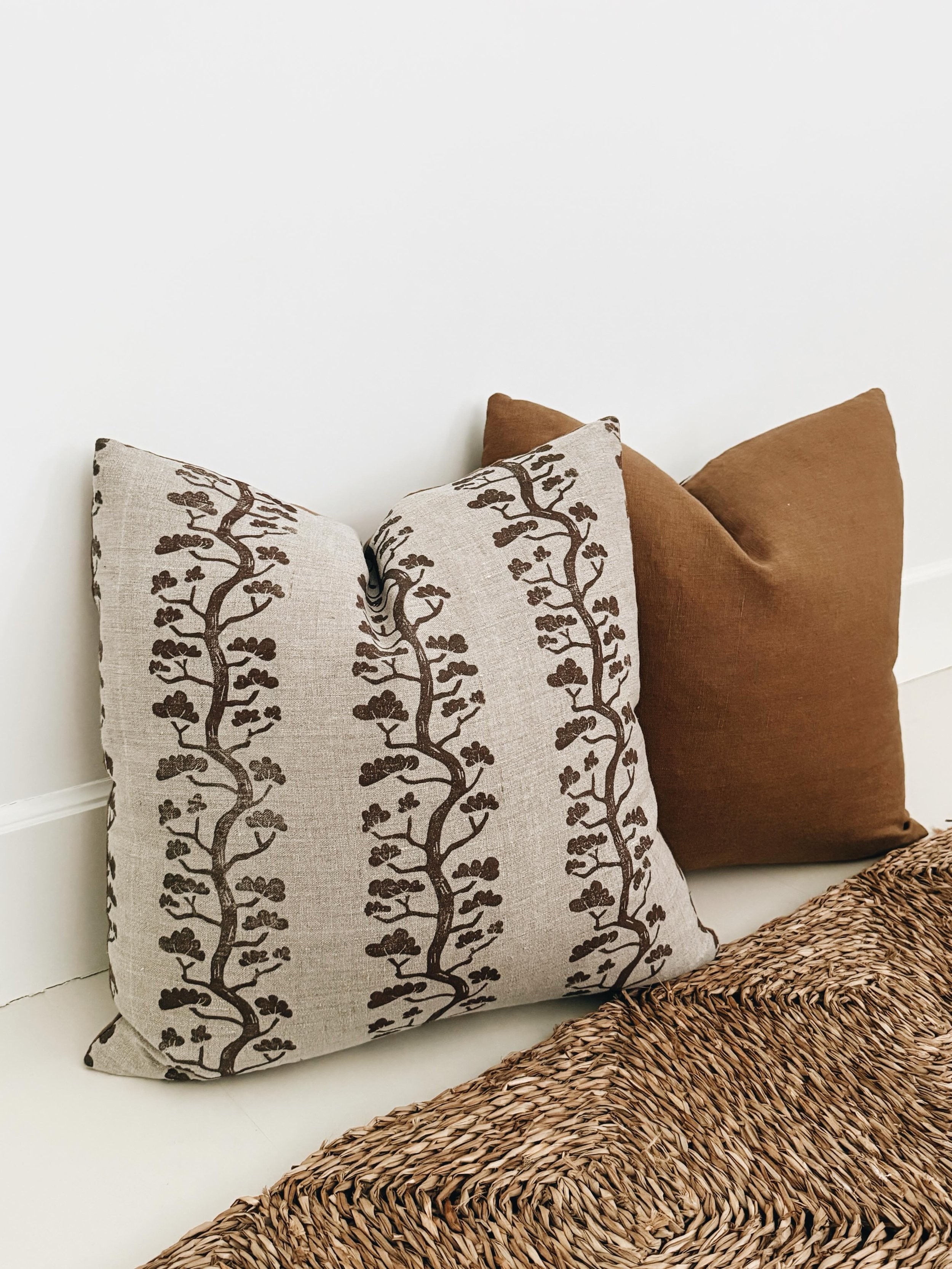 First set of hand block printed cushions.

Hand carved and printed on natural linen from a Korean red pine tree motif and sewn into finished cushions with a solid tobacco linen reverse.