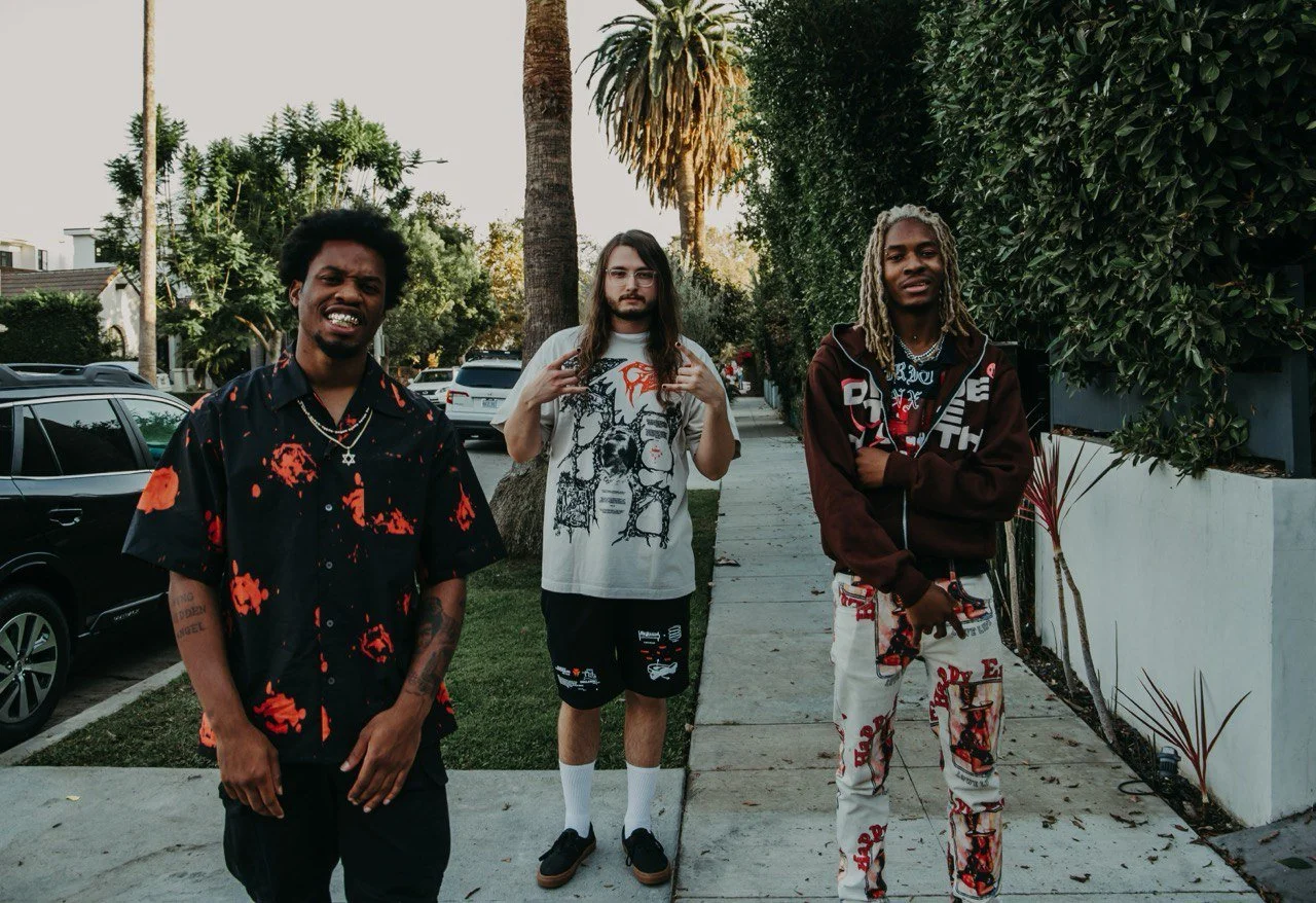 Spock standing with Denzel curry and Jasiah