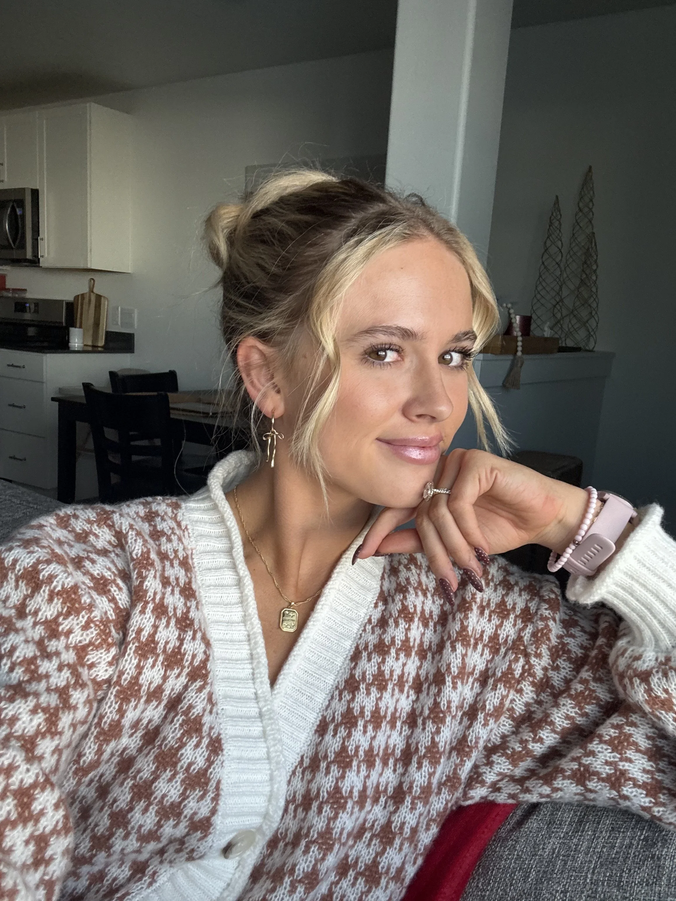 Smiling, tanned woman in PJ's