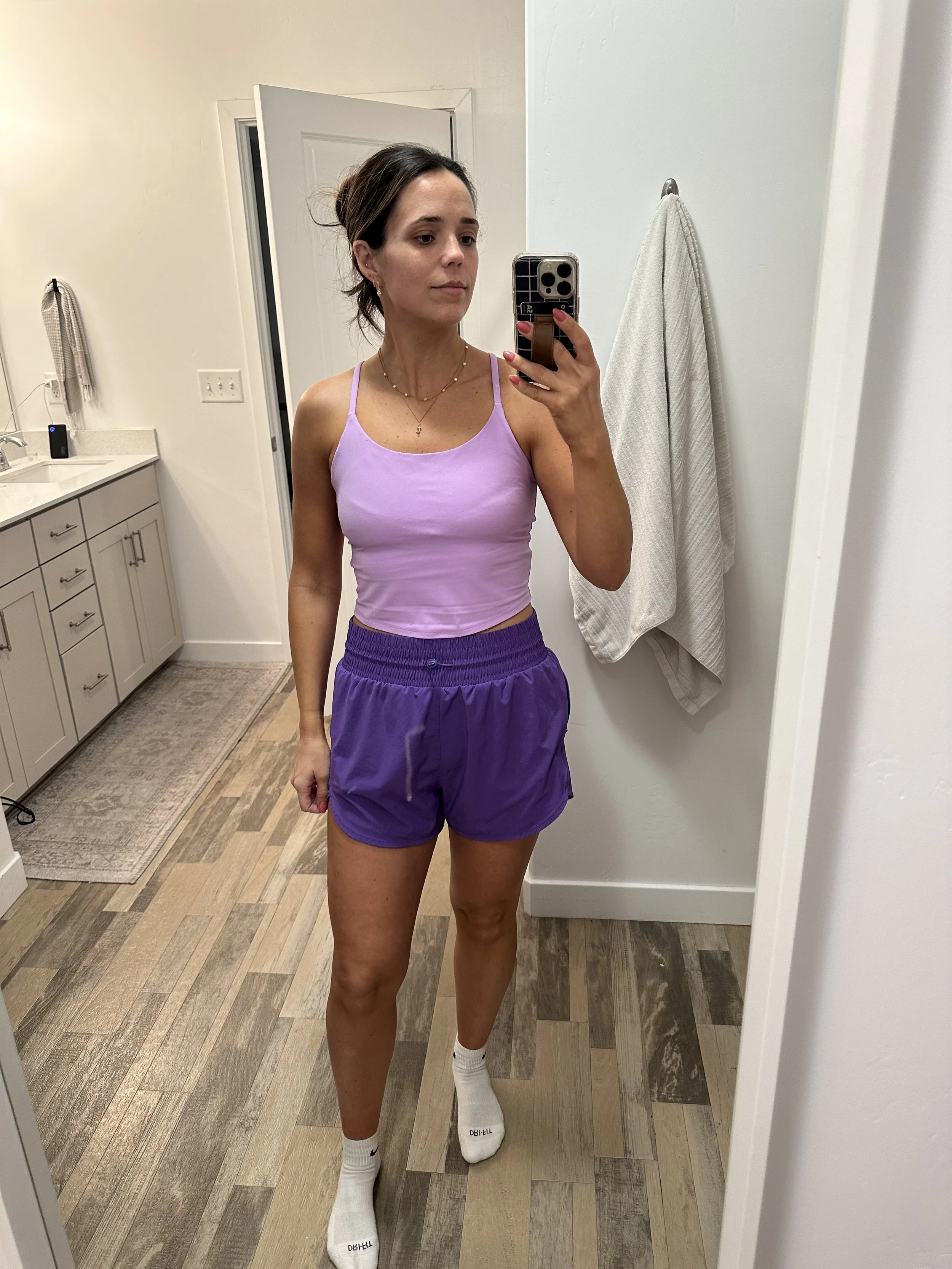 Mirror selfie to show off airbrushed spray tan