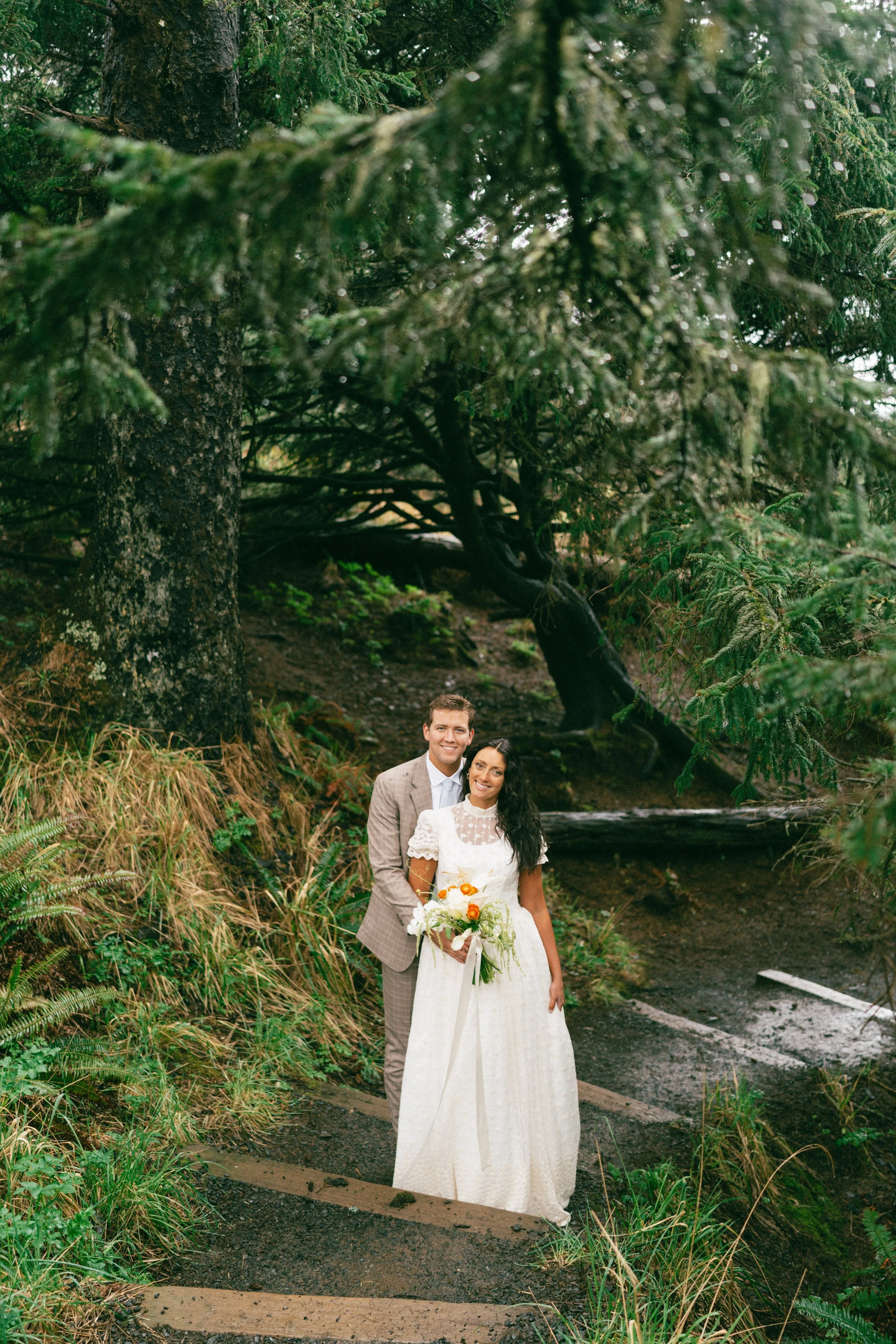 couple standing on steps