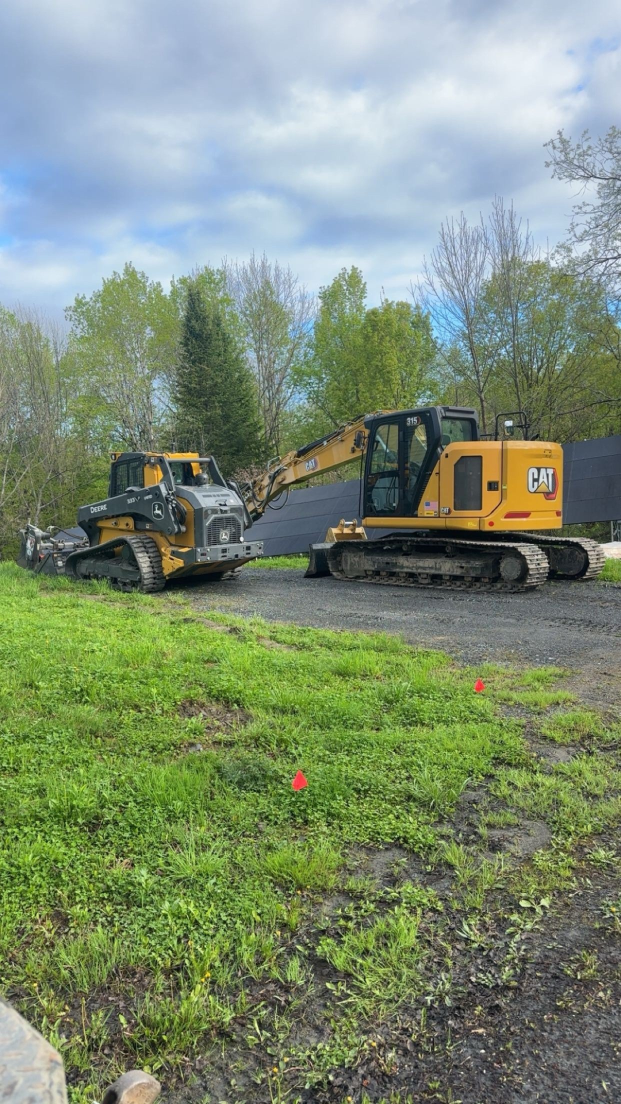 Staging an excavator and skid steer in Plainfield, VT