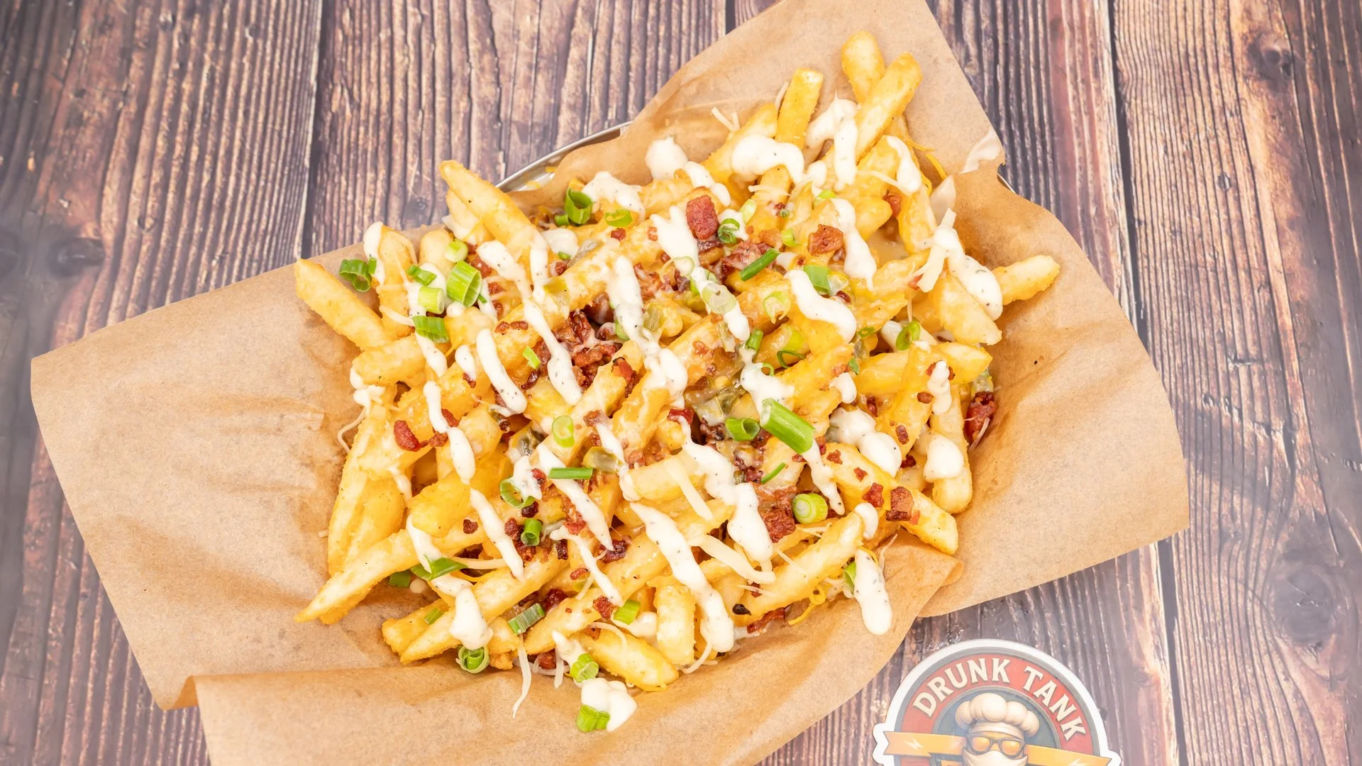 DRUNK TANK GRILL_Cheddar Bacon Ranch Fries.jpg