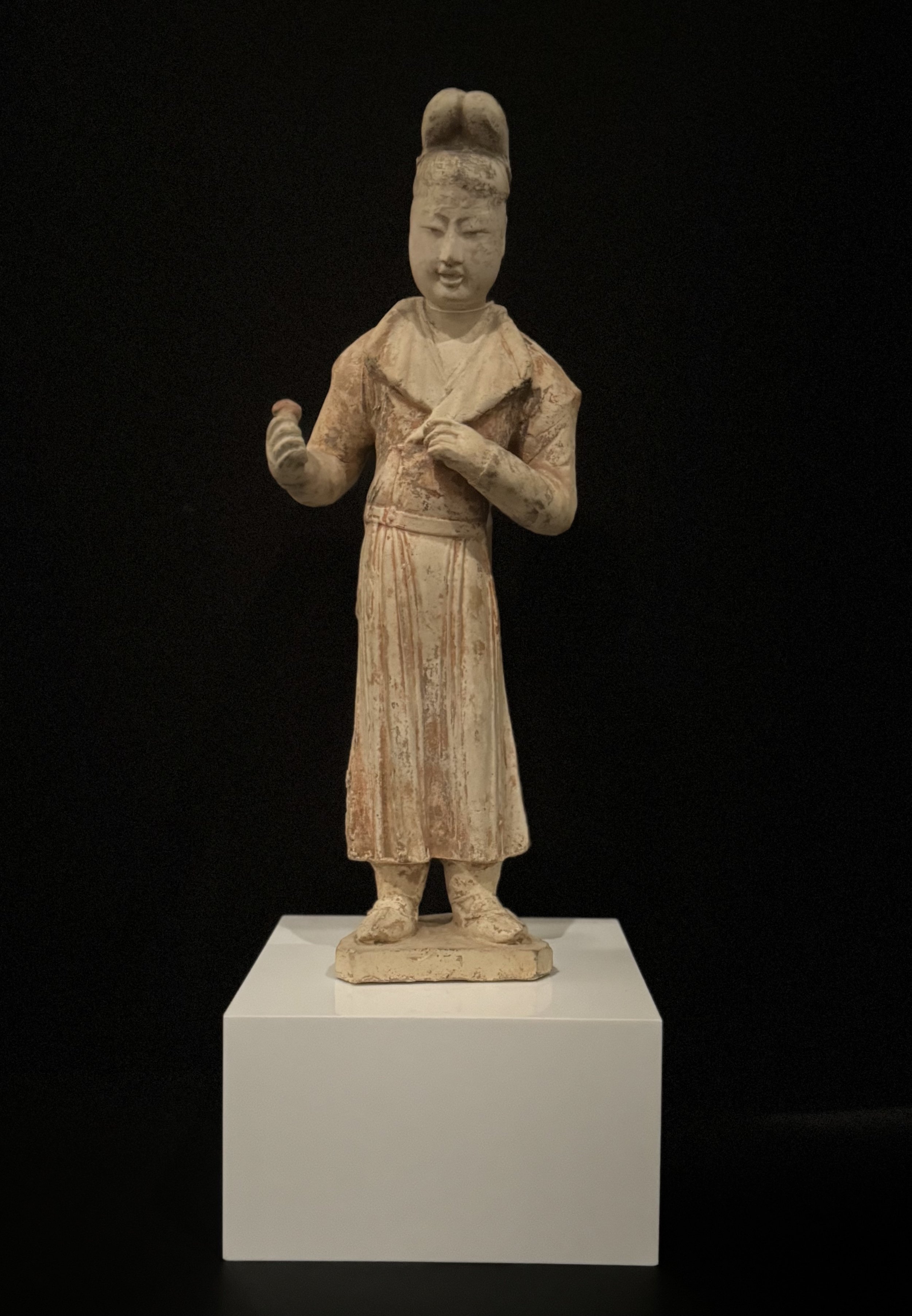 Painted Pottery Figure of Male Courtier, Tang Dynasty. The Alan and Simone Hartman collection.