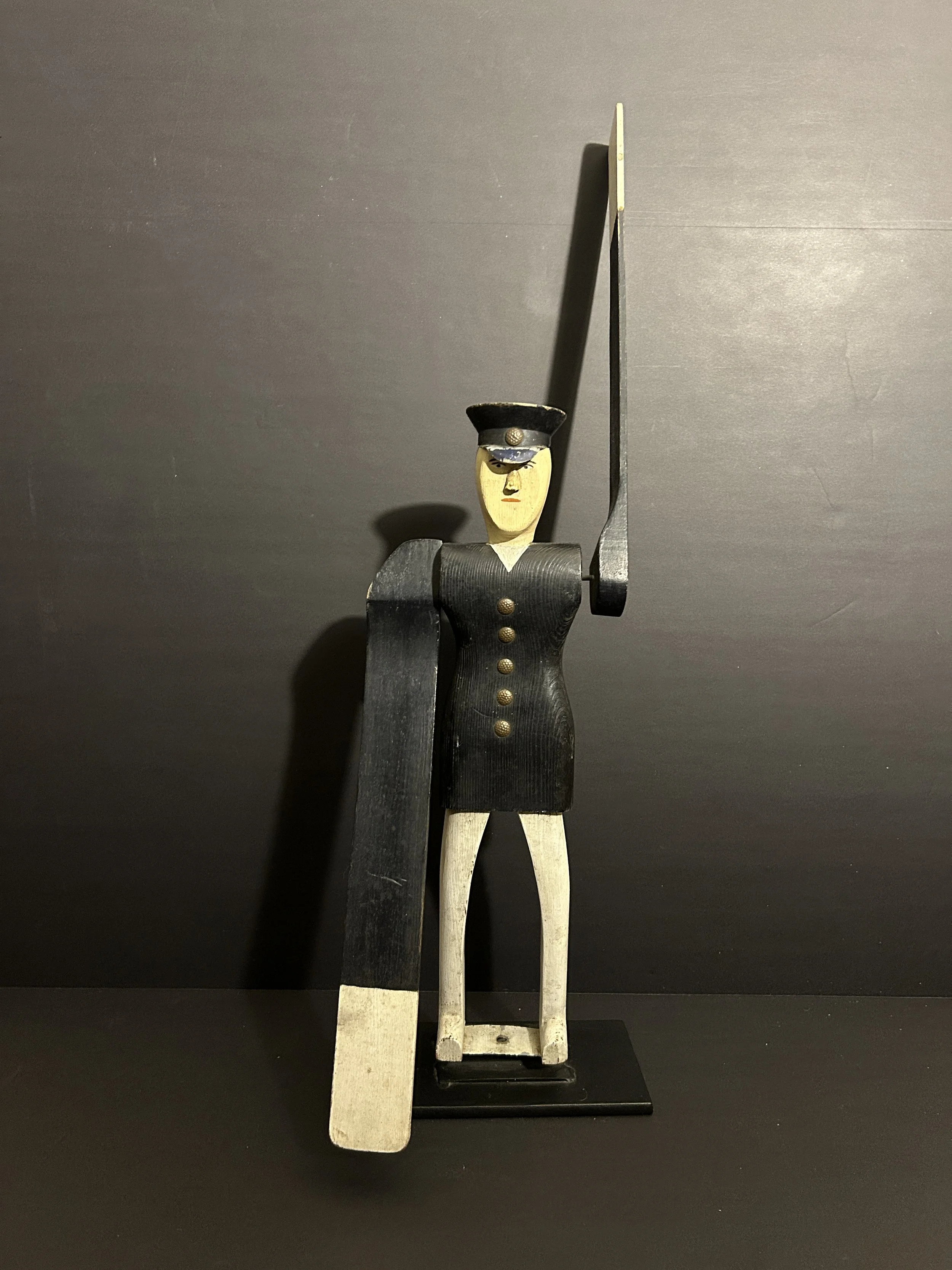 A Carved Whirligig of a Policeman (1910-1920).