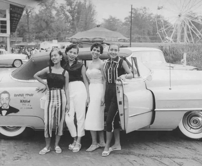 Green Book for Motorists, vintage image of Black women in front of retro car