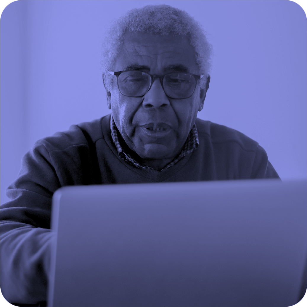 Elder Black Man on Computer, Take the Green Book For Health Survey