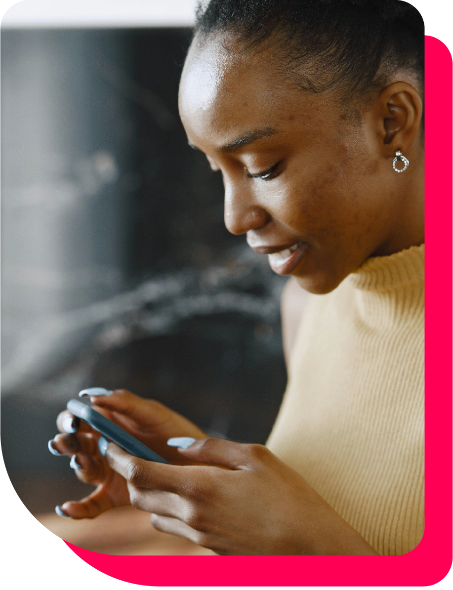 Black woman on the phone filling out Green Book for Health survey
