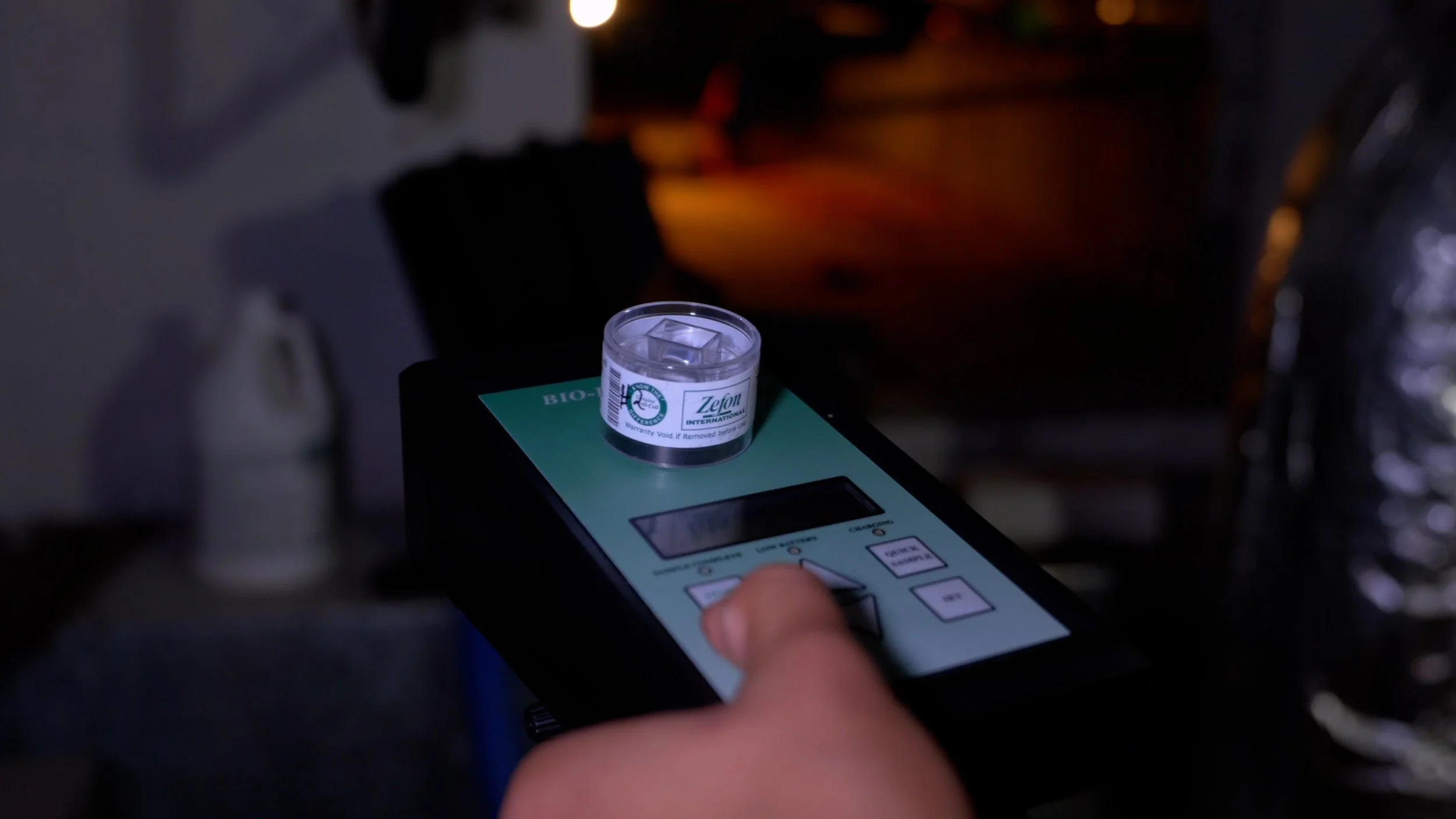 Mold air sampling pump with spore trap cassette used during a mold assessment