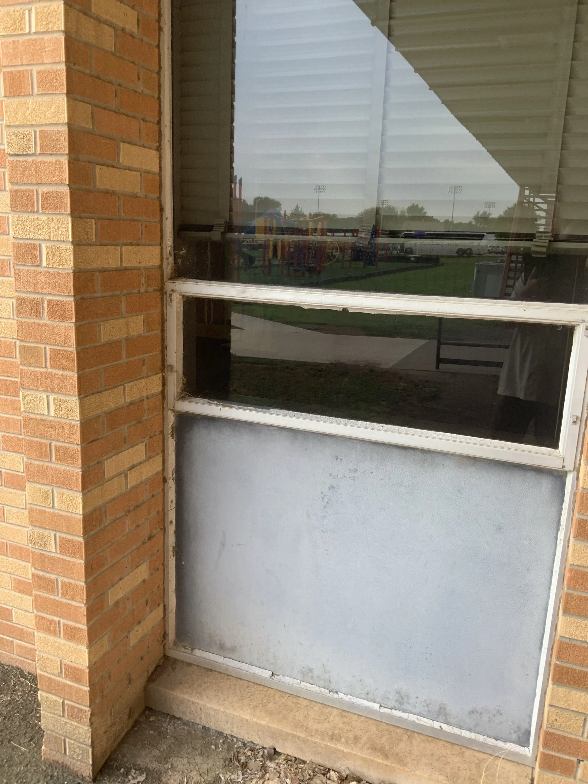 ELEMENTARY SCHOOL - Exterior Wall Stabilization (evidence of moisture intrusion, weathered mortar and loose bricks)