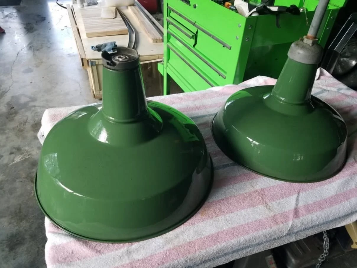 **SOLD** Huge matching pair of industrial green enamel light shades in good condition. No electricals included in sale so will need re-wired. 25&rdquo; wide X 16&rdquo; tall.