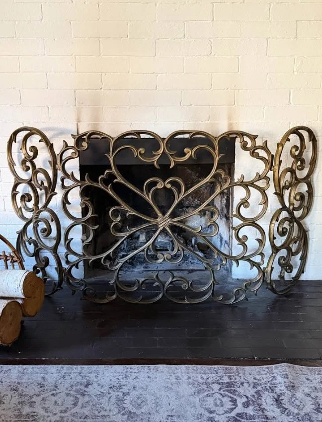 **SOLD** Vintage bronze fire screen. Extremely beautiful and very heavy. Tri fold design opens out to max of 55&rdquo; and height 27&rdquo;.