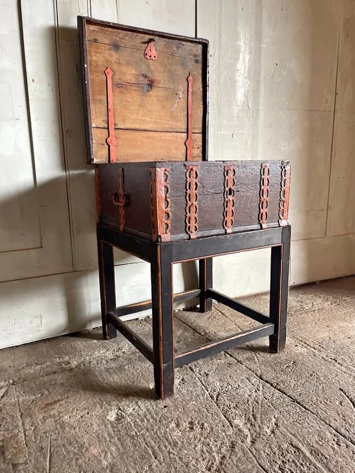**SOLD** A charming and characterful late 18th-century painted dowry chest, dated 1771, likely Scandinavian in origin, retaining its original hand-painted iron strapwork and black painted base. The chest features beautifully stylised foliate ironwork
