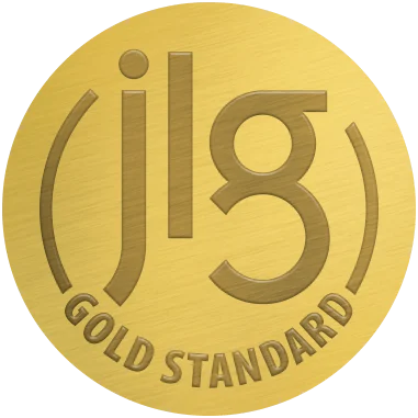 Gold-colored coin with the letters 'Jg' and the words 'GOLD STANDARD' inscribed around the edge.