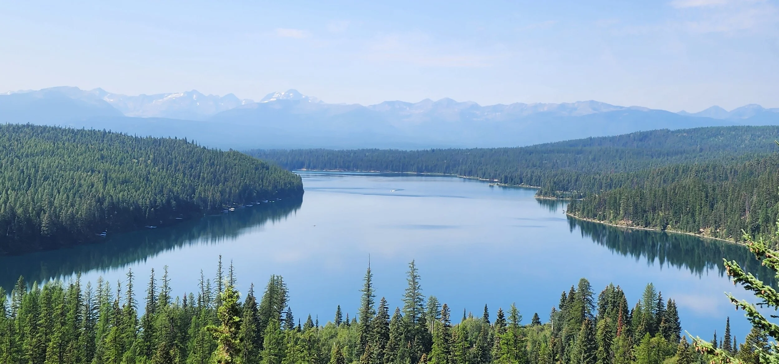 Beautiful picture of Montana lake with mountains in the distance