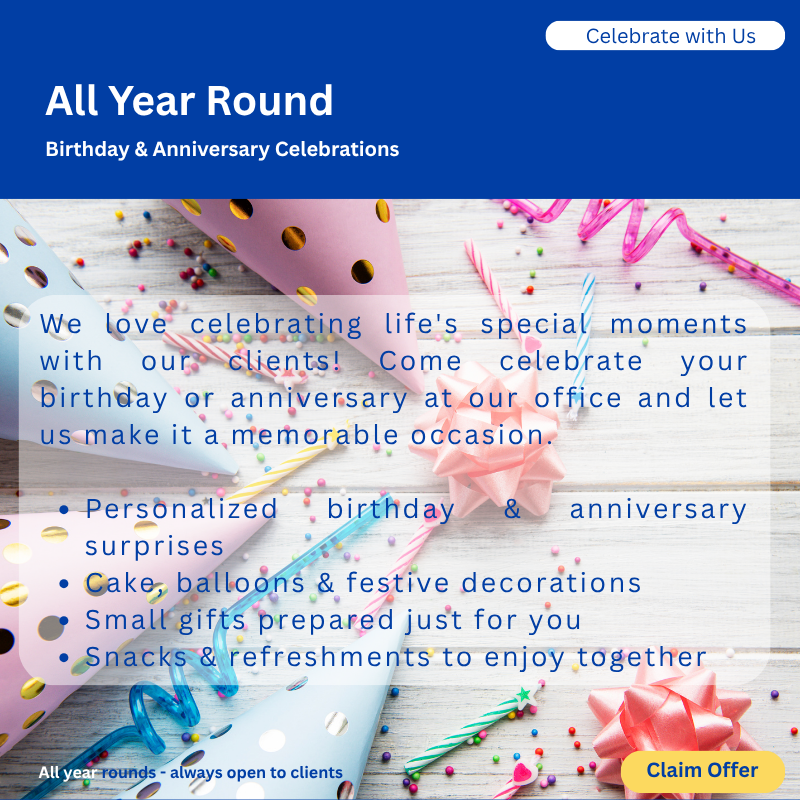 Background with birthday and celebration decorations including paper party hats, colorful confetti, curled ribbons, small gifts, and snacks on a white wooden surface.
