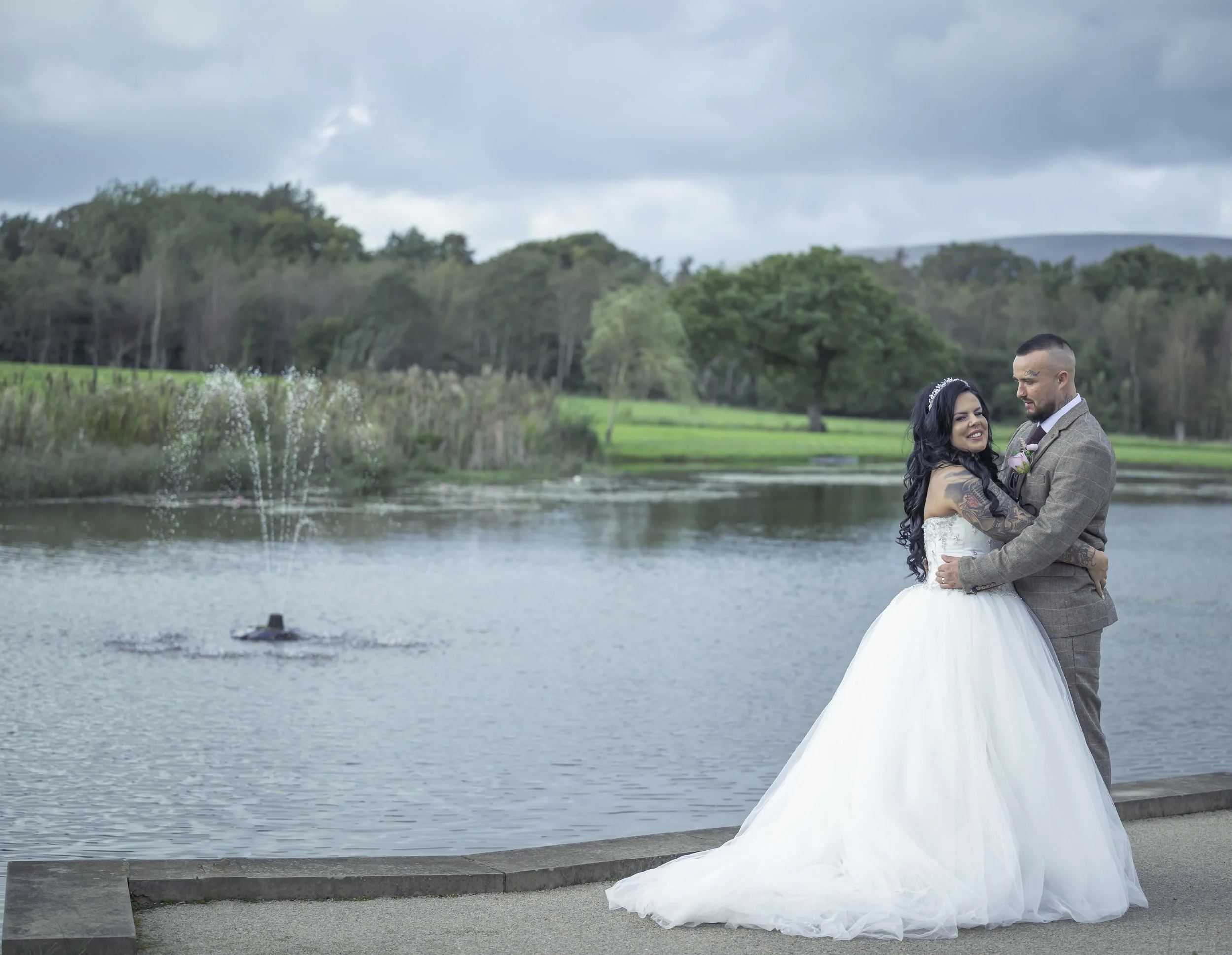 Candid wedding photography at crow wood hotel Burnley Lancashire, natural couple 

Crow Wood Hotel and Spa sits in 40 acres of Lancashire parkland with an ornamental lake that catches the light beautifully at golden hour. Documentary wedding photogra