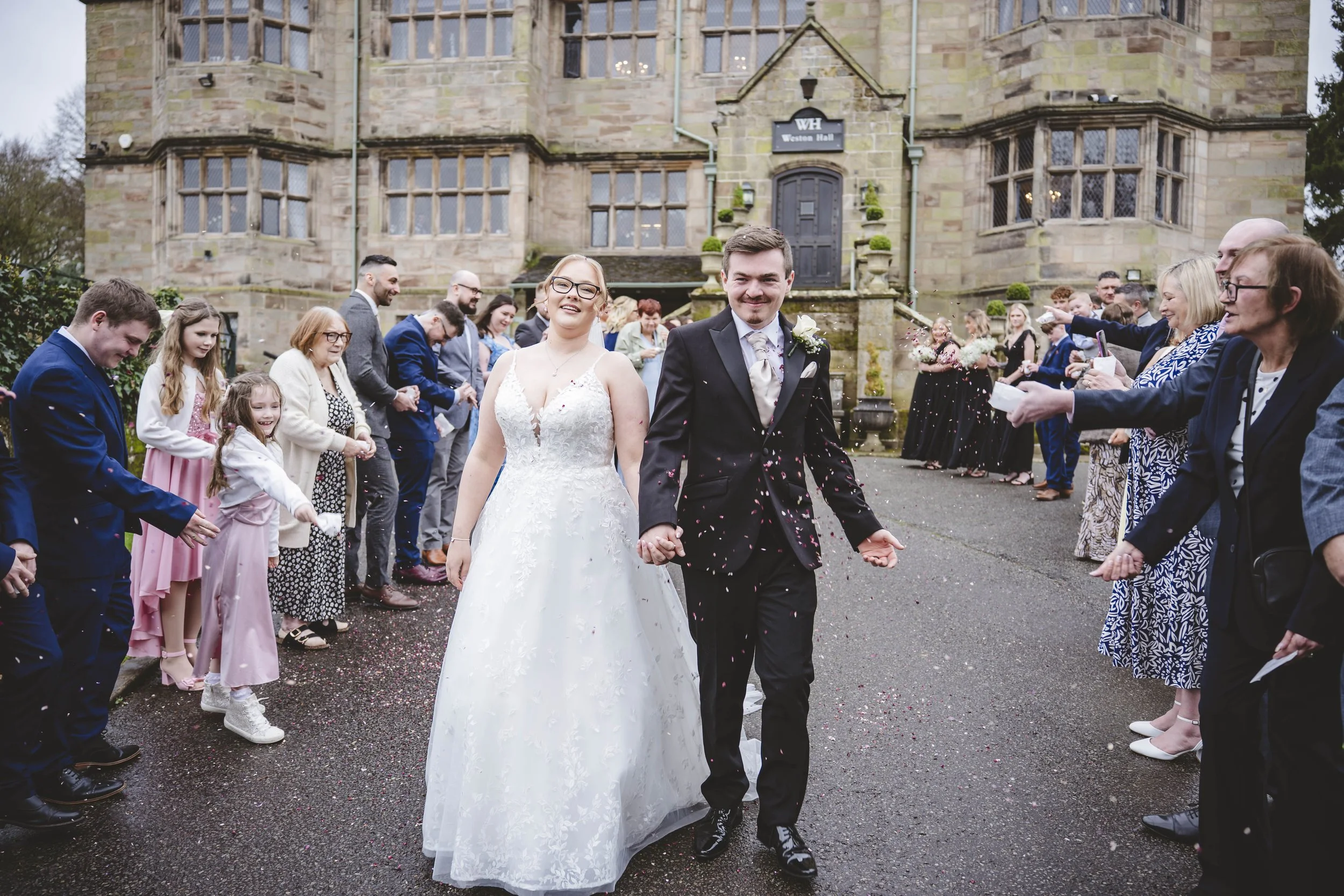 Documentary wedding photographer at Weston hall Stafford Staffordshire, candid couple moment in grade ii listed manor

Weston Hall's Grade II listed Staffordshire manor house brings centuries of character to every wedding day. Documentary photography