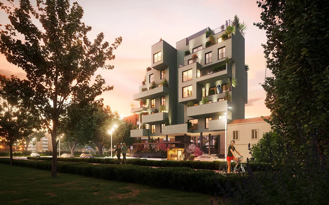 Edificio moderno de apartamentos en un entorno urbano, con personas paseando y una mujer con bicicleta, al atardecer.