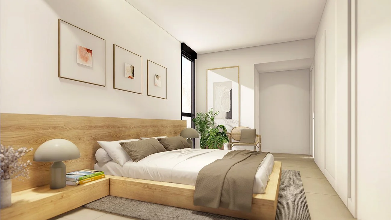 Dormitorio moderno con cama de madera, mesas de noche con lámparas, arte en las paredes y una planta en una esquina