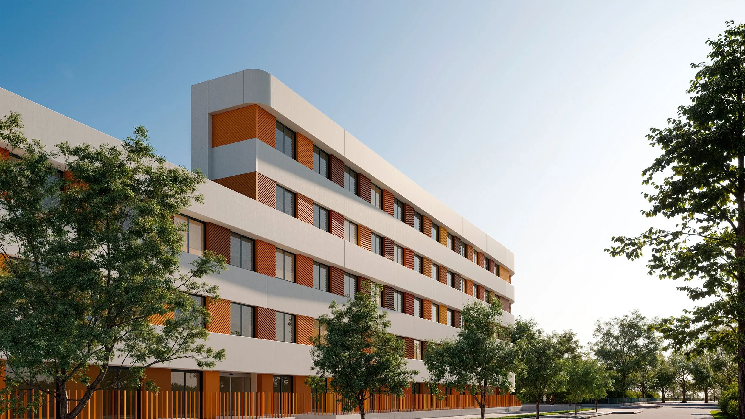 Edificio moderno de varios pisos con ventanas y detalles de color naranja, rodeado de árboles verdes bajo un cielo despejado.