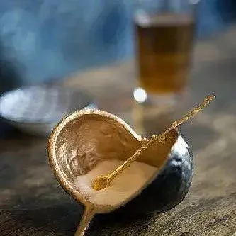 Brown and Gold Pod Bowl with One 4 Gold Spoon.jpg