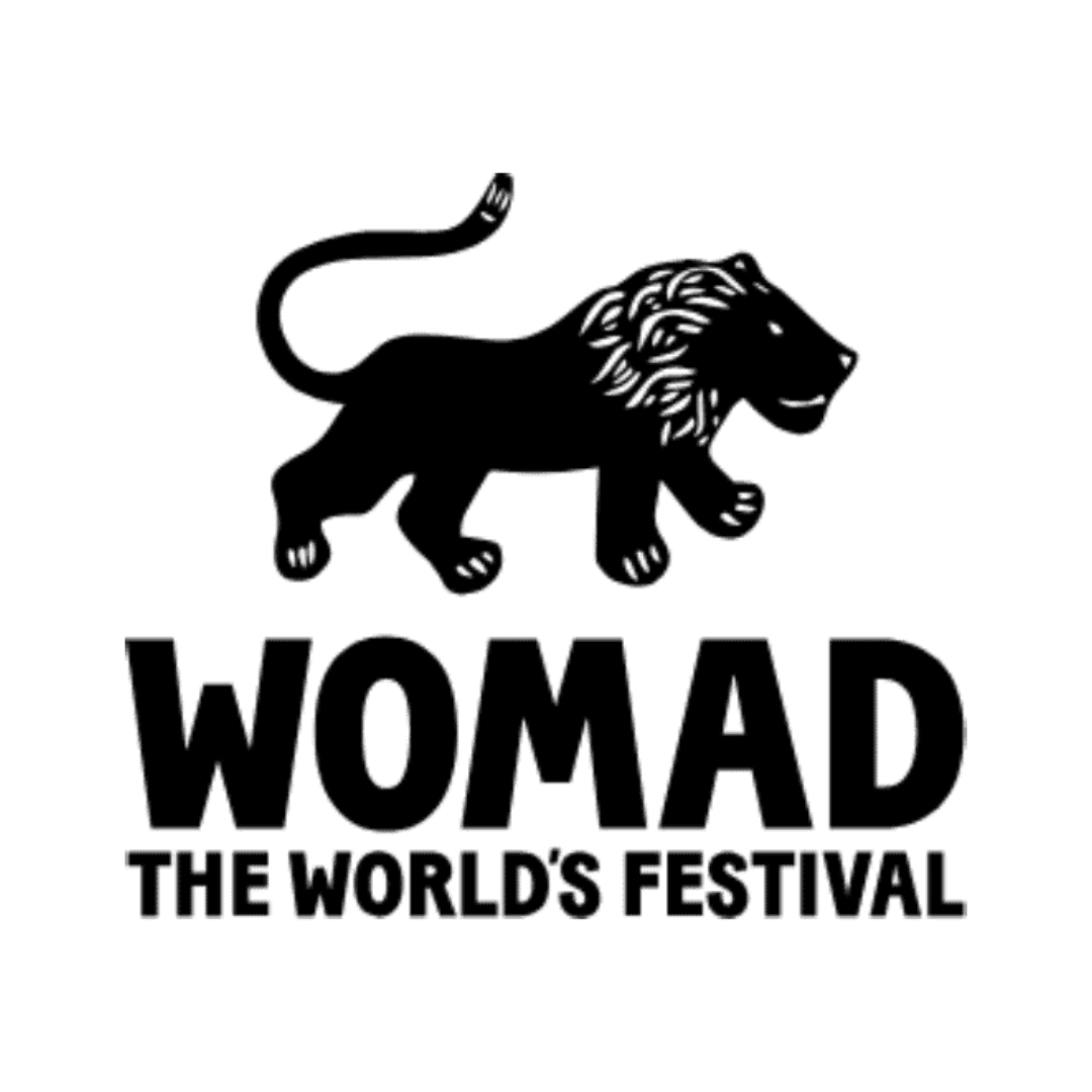 Black and white logo for WOMAD the world's festival with a lion illustration and the text 'WOMAD THE WORLD'S FESTIVAL'.