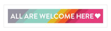 Sign with colorful rainbow background that says 'ALL ARE WELCOME HERE' with a heart symbol.