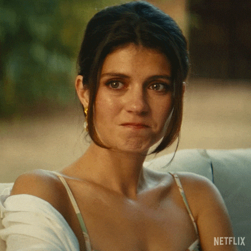 A still from People We Meet on Vacation capturing feminine longing beneath self-protection, a common pattern explored in embodiment and intimacy coaching.