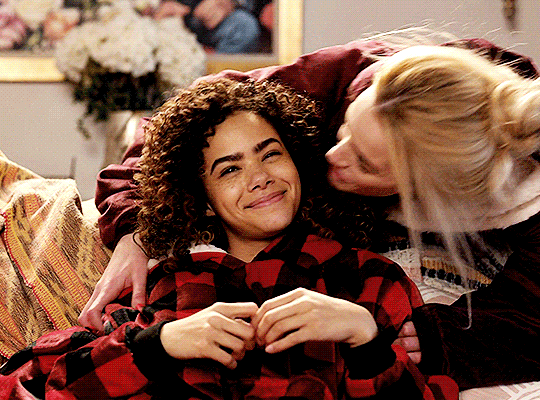 A tender moment between mother and daughter exploring emotional safety in motherhood and nervous system regulation.