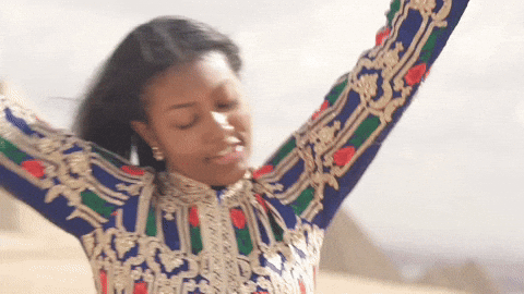 Person moving freely with arms outstretched, representing embodied sexuality and self-expression.